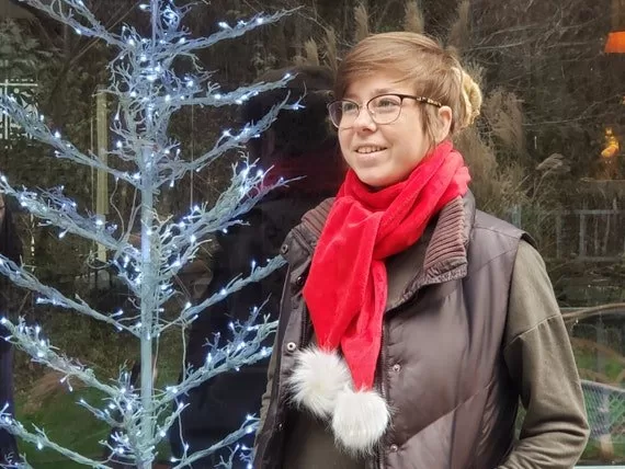 Soft red holiday scarf with faux fur pom poms