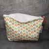 Open view, cotton fabric accessory bag with small assorted rainbows pattern, 9.5 inches long and 6.5 inches tall. Features a zip closure on top with a convenient zipper pull, and a boxed bottom. Lined with white cotton fabric.