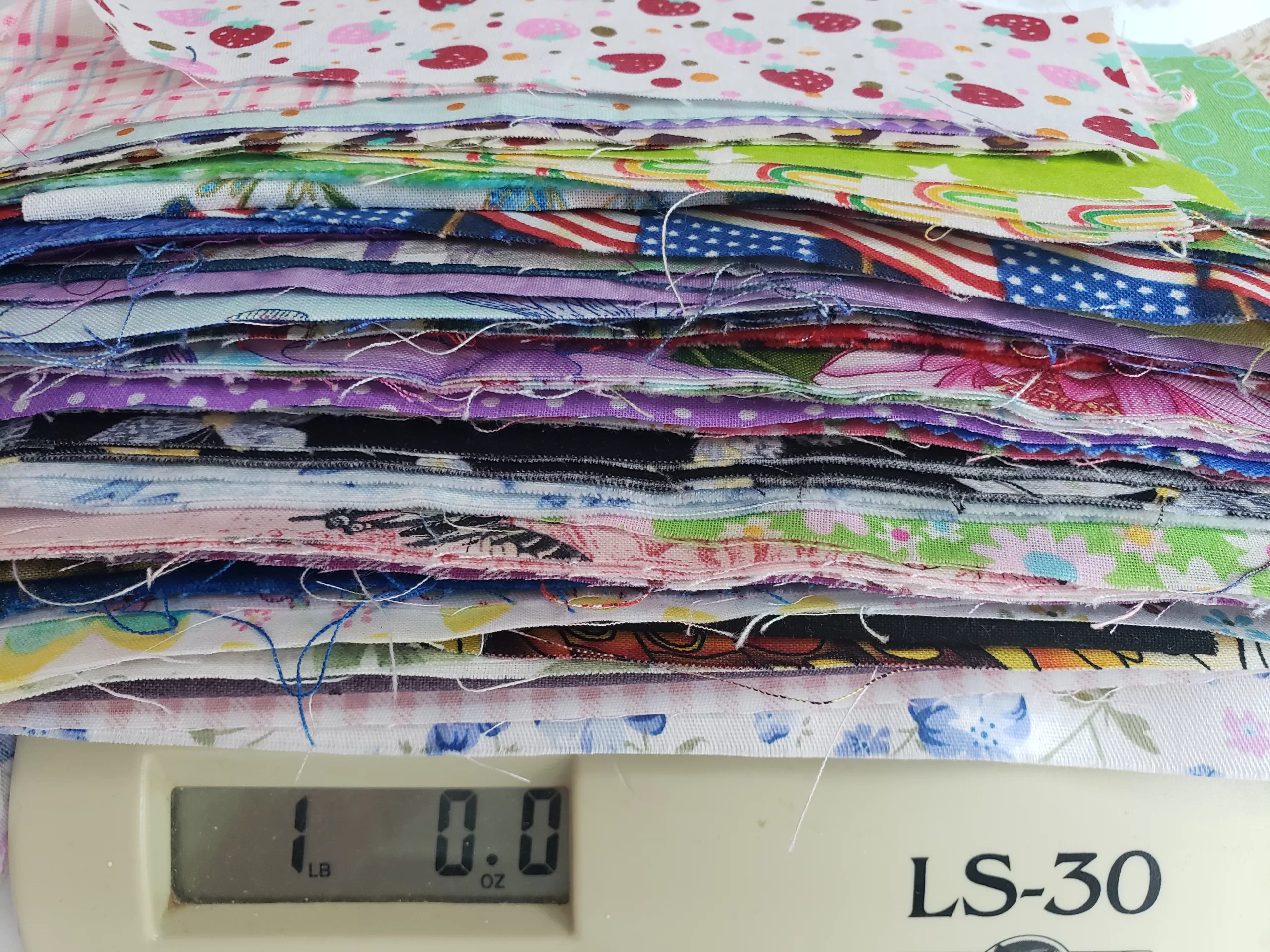 One full pound of quality cotton fabric scraps. A variety of patterns. Perfect for a wide range of craft, sewing, and DIY projects.