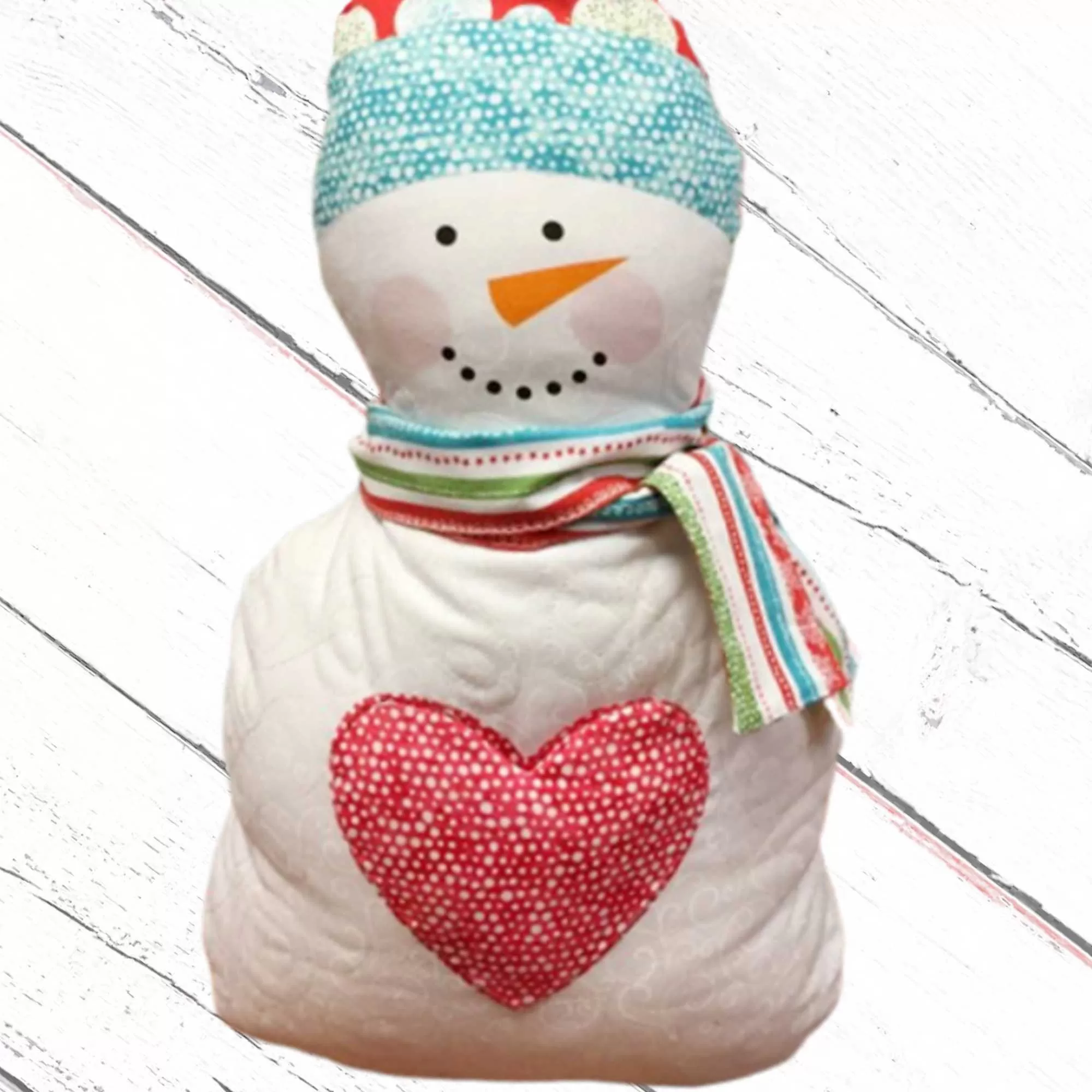 1 panel. Hearty the Snowman by Benartex. Makes 1 snowman with scarf* Instructions included on panel. *Panel and instructions only. Additional supplies will be needed to make this project, they are not included.