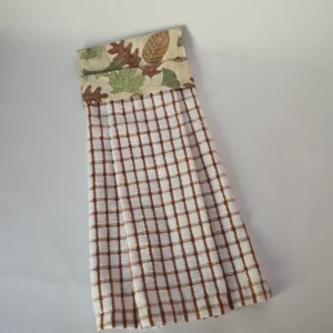 Autumn Leaves Stay Put Kitchen Towel with fabric topper, easy to place on oven door handle, fall-themed with autumn leaves pattern, stays securely in place.