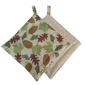 Handmade quilted potholders with an autumn leaves pattern in browns and greens, sold in a set of 2, perfect for adding seasonal charm to your kitchen decor.