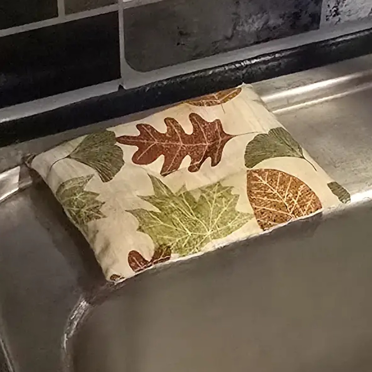 Autumn Leaves Eco-Friendly Dish Scrubber, 5x4 inches, featuring a vibrant autumn leaves design, dual-sided for versatile cleaning, and padded for comfort and durability.