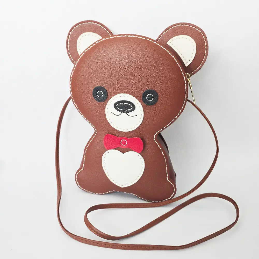 Handmade teddy bear character purse in brown vegan leather, 10 inches tall, with zip closure and crossbody strap. Cute and perfect for gifting
