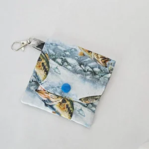 Handmade fishing wallet for cards and paper cash, featuring three pockets, a snap closure, and a lobster claw clasp, made from 100% cotton fabric.
