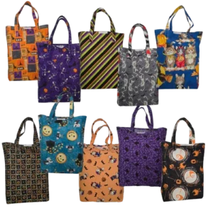 Handmade cotton trick-or-treat bag with boxed bottom, 12" tall, 8" wide, assorted Halloween patterns, sturdy carry handles